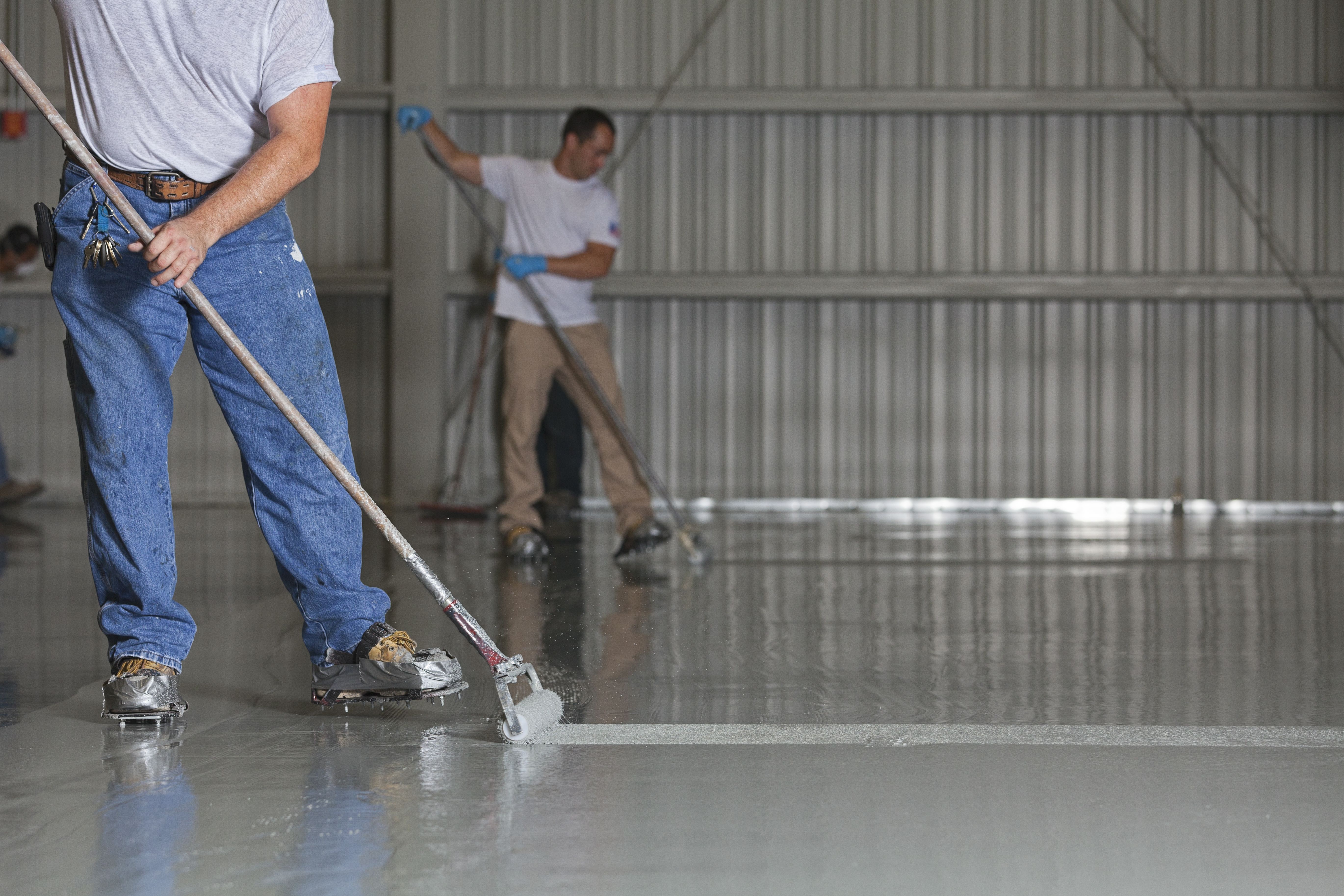 coating being applied to commercial floor
