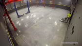 QuestMark polished concrete specialists working on auto garage