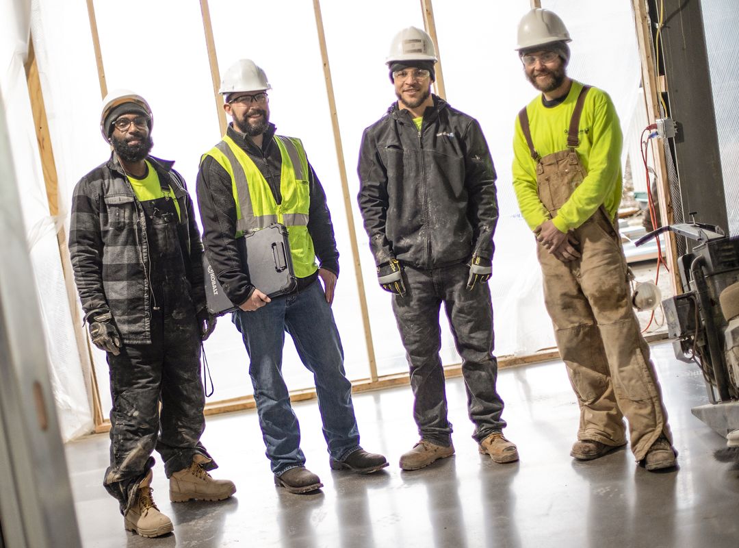 four men on construction crew that have careers at QuestMark